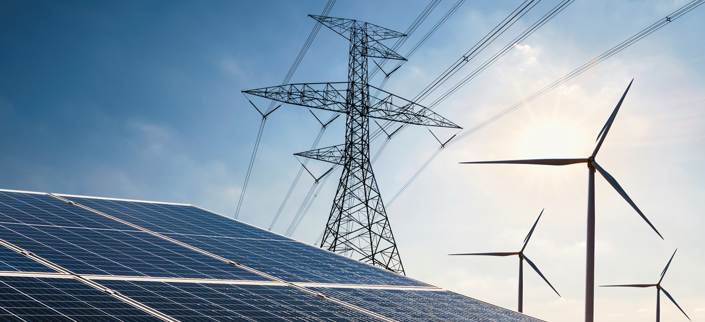 Electricity Power Nature Clean Energy Concept Solar Panel With Turbine Tower Hight Voltage